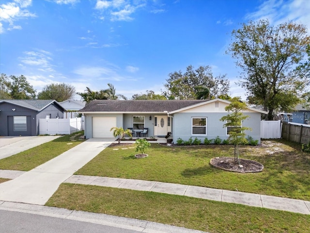 ranch-style home with stucco siding, concrete driveway, an attached garage, a front yard, and fence