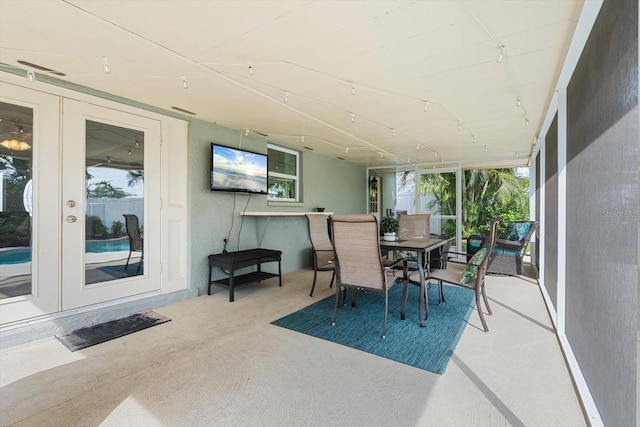 sunroom featuring french doors