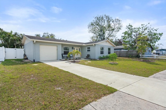 single story home with a garage, fence, a front lawn, and stucco siding