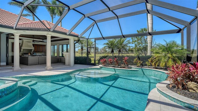 view of swimming pool with a patio, an outdoor living space, a pool with connected hot tub, and a ceiling fan