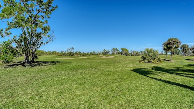 view of yard with golf course view