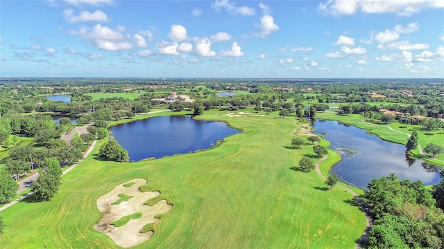 aerial view with a water view and golf course view