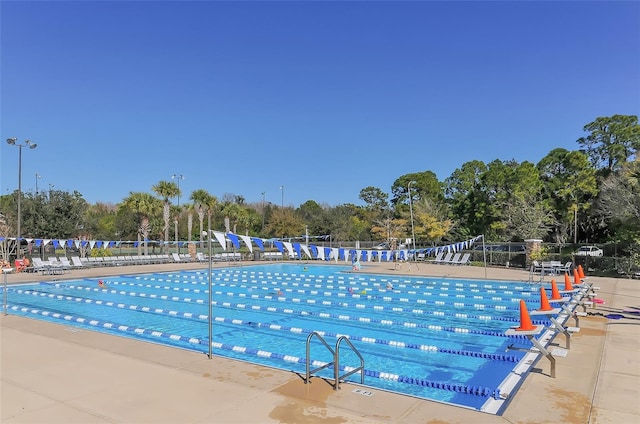 community pool with fence