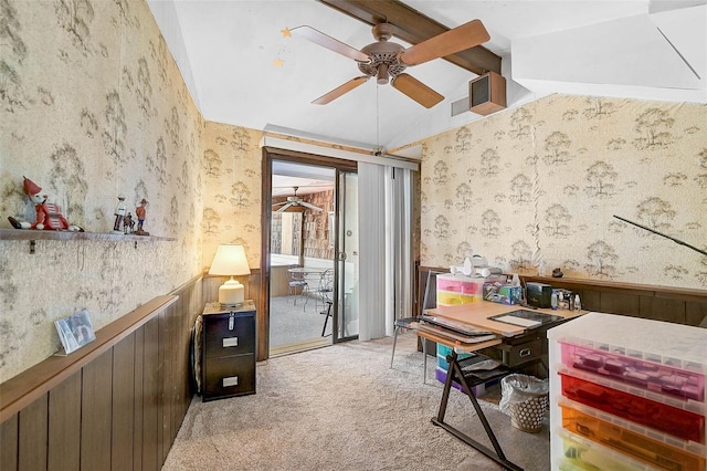 interior space featuring vaulted ceiling with beams, ceiling fan, wainscoting, and wallpapered walls