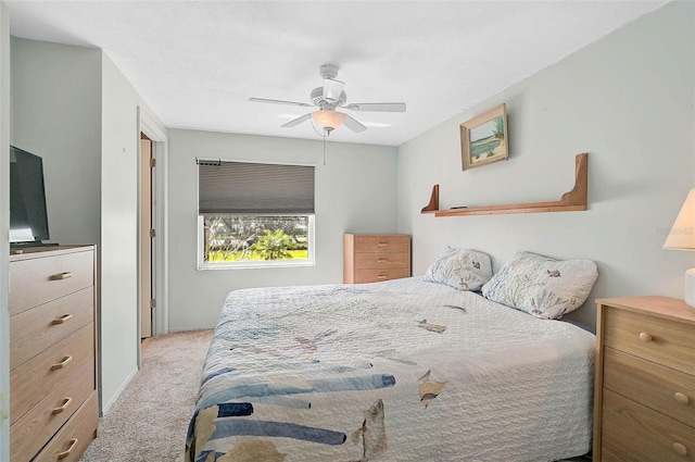 bedroom featuring ceiling fan and light colored carpet