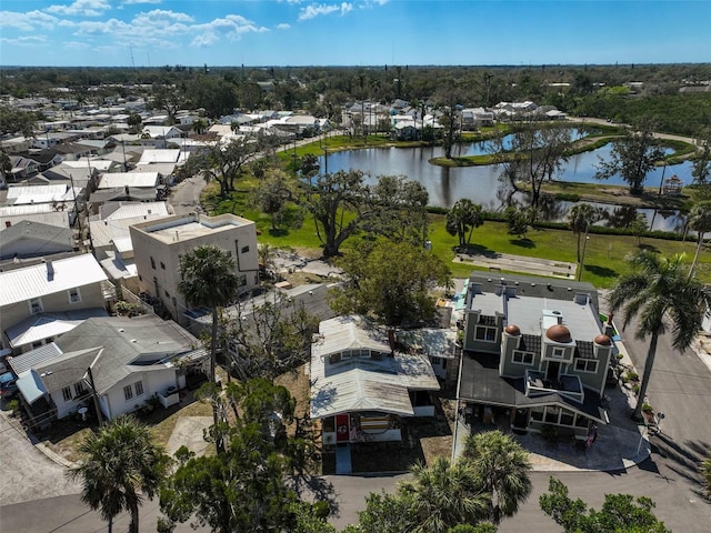 birds eye view of property featuring a water view and a residential view