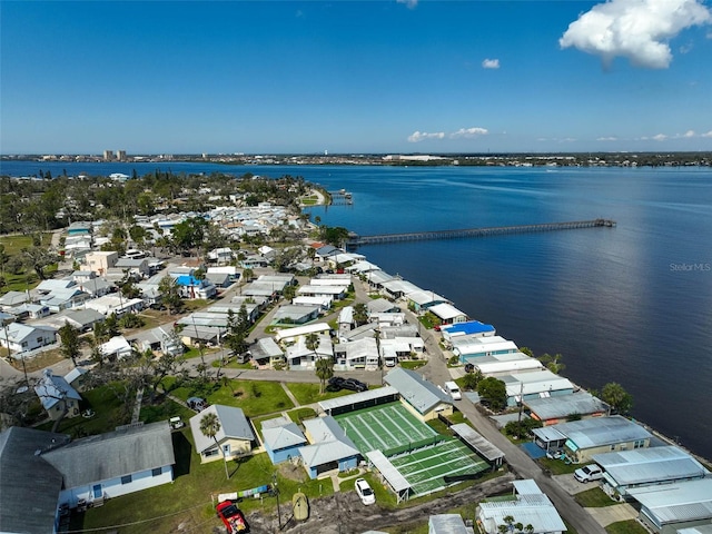 aerial view featuring a water view and a residential view