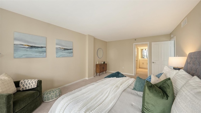 carpeted bedroom featuring visible vents and baseboards