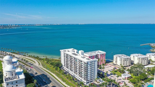 bird's eye view featuring a water view and a city view