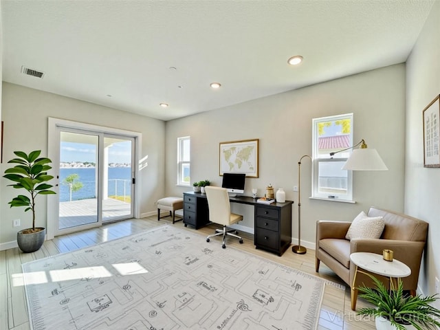 16832 Bolsena Dr, Bella Collina, FL 34756 - office space featuring healthy amount of natural light, wood finished floors, baseboards, and recessed lighting