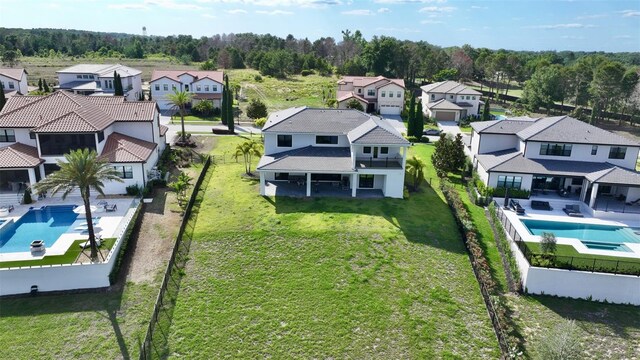 16832 Bolsena Dr, Bella Collina, FL 34756 - aerial view of residential area featuring a pool area and a forest