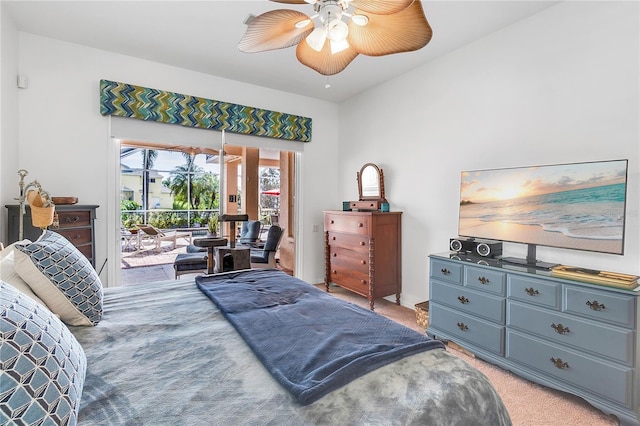 bedroom with access to outside, a ceiling fan, and light carpet