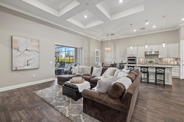 living area with a towering ceiling, baseboards, and dark wood-type flooring