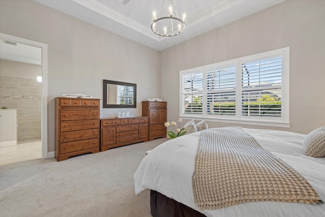 bedroom with a tray ceiling, crown molding, light colored carpet, visible vents, and a chandelier