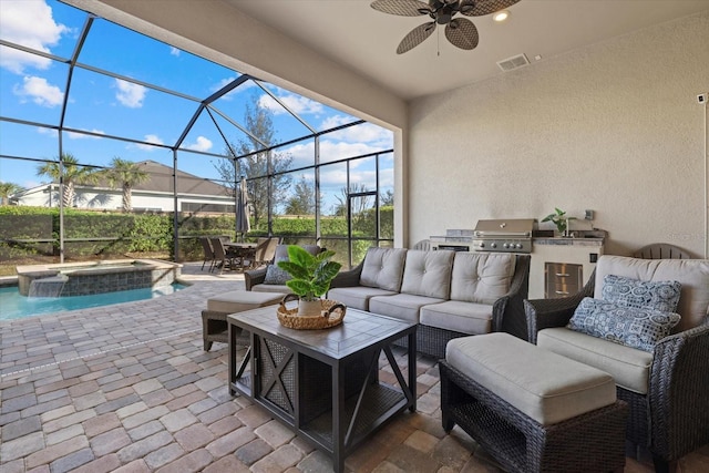 view of patio with glass enclosure, an in ground hot tub, outdoor lounge area, exterior kitchen, and grilling area