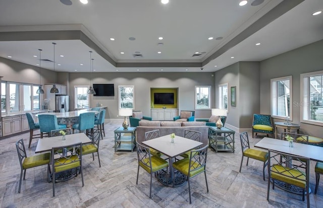 dining space with a tray ceiling, visible vents, baseboards, and recessed lighting