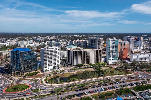 birds eye view of property with a view of city