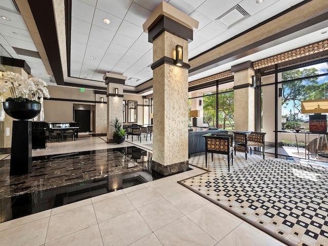 building lobby featuring visible vents