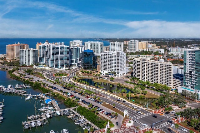 bird's eye view featuring a water view and a view of city