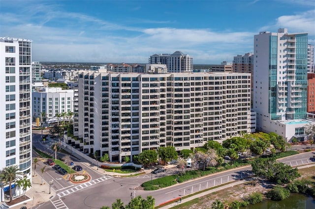 birds eye view of property featuring a city view