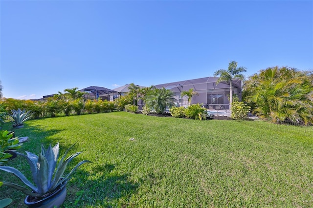 4516 Renwick Dr, Parrish, FL 34219 - view of green lawn with a lanai