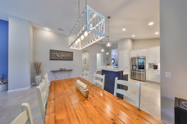 4516 Renwick Dr, Parrish, FL 34219 - dining space with recessed lighting and light tile patterned floors