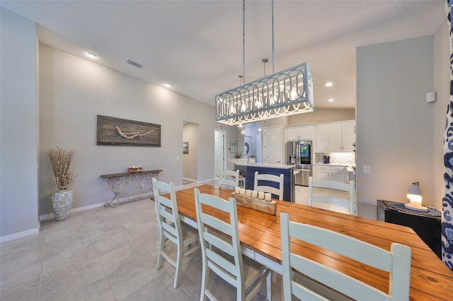 4516 Renwick Dr, Parrish, FL 34219 - dining area with recessed lighting and light tile patterned flooring