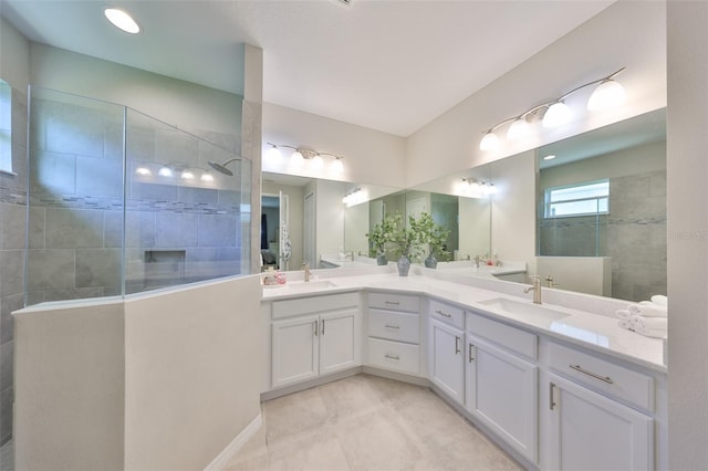 4516 Renwick Dr, Parrish, FL 34219 - bathroom with a walk in shower, double vanity, and tile patterned flooring