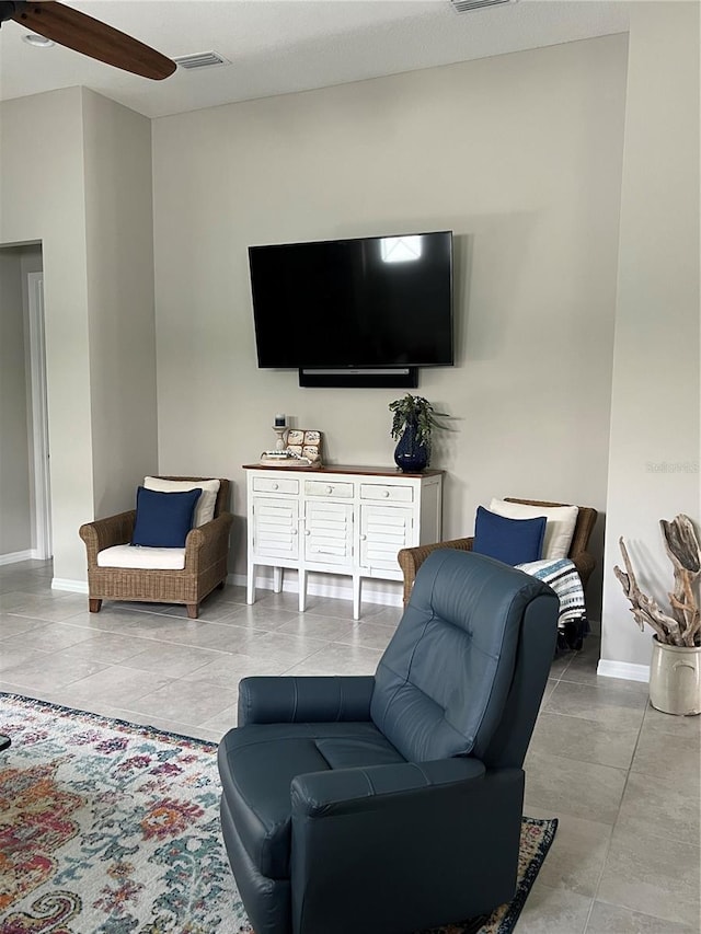 4516 Renwick Dr, Parrish, FL 34219 - living area featuring ceiling fan and baseboards