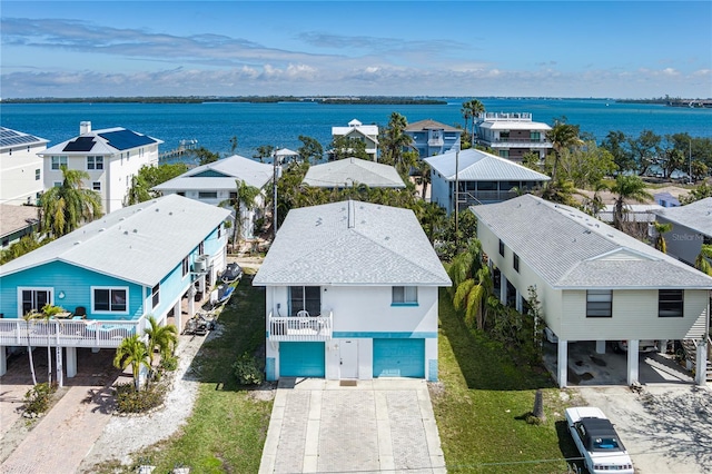 aerial view with a water view and a residential view