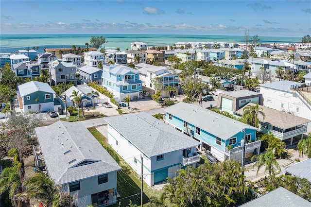 aerial view featuring a water view and a residential view