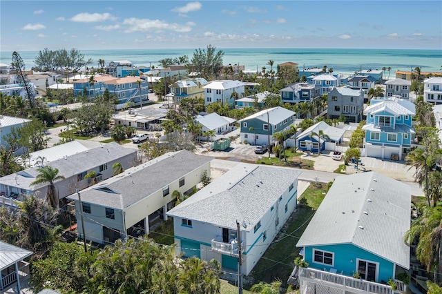 bird's eye view with a residential view and a water view