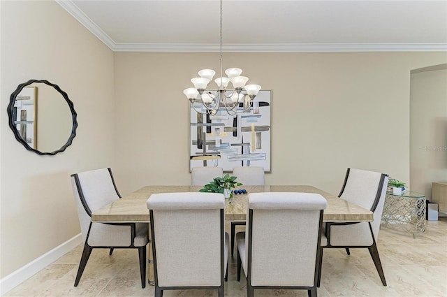 dining space featuring an inviting chandelier, baseboards, and ornamental molding