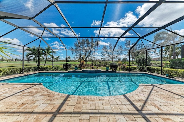 outdoor pool featuring a patio and a lanai