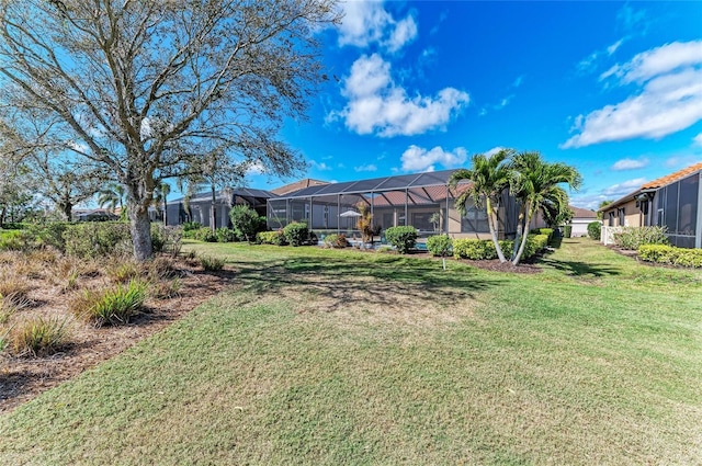 view of yard featuring a lanai