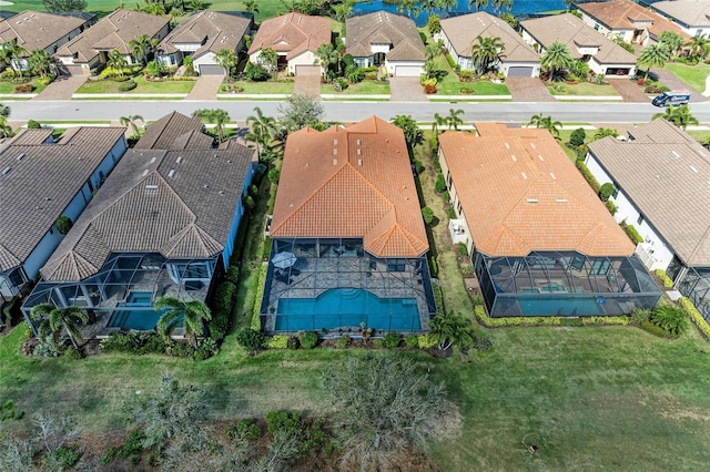 birds eye view of property with a residential view