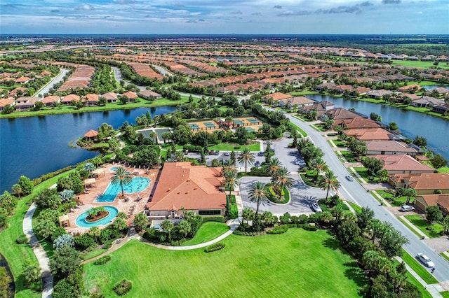 aerial view with a water view and a residential view