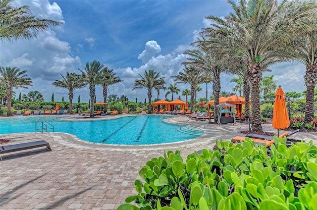 pool with a patio area