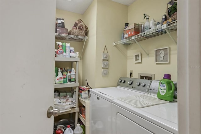 laundry room with laundry area and washing machine and dryer