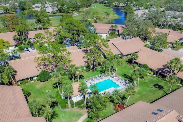 birds eye view of property featuring a water view and a residential view