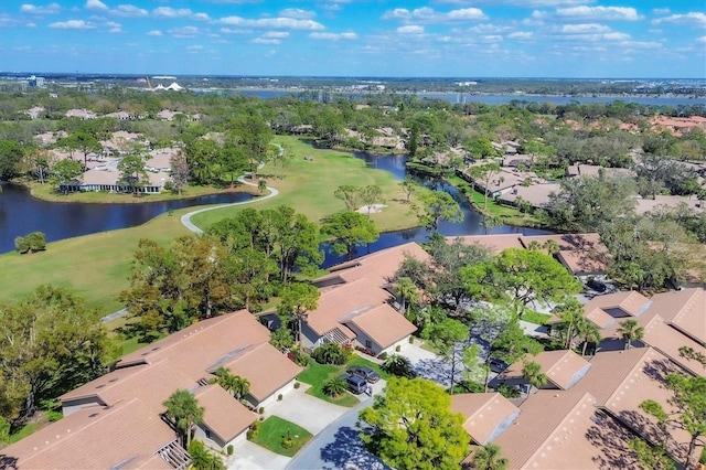 bird's eye view featuring a water view and a residential view