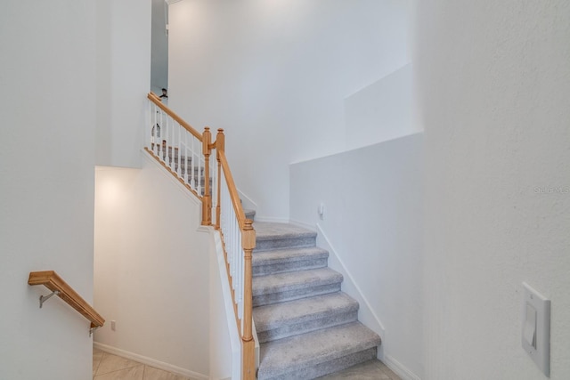 stairway with baseboards