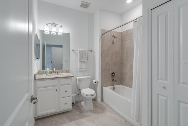 bathroom with toilet, vanity, visible vents, a closet, and shower / tub combo with curtain