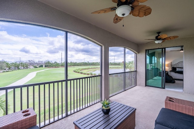 sunroom / solarium featuring vaulted ceiling