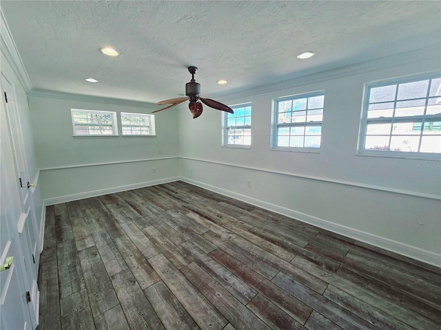 unfurnished bedroom featuring dark wood-style flooring, crown molding, recessed lighting, a textured ceiling, and baseboards