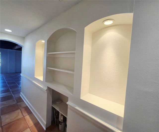 611 19th Ave W, Palmetto, FL 34221 - corridor with tile patterned floors and built in features