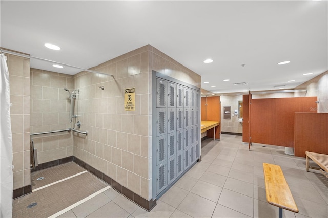 full bathroom featuring tile patterned flooring, a walk in shower, and recessed lighting