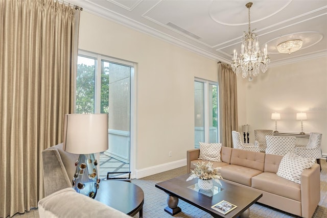 living room featuring ornamental molding, visible vents, baseboards, and an inviting chandelier