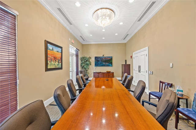 office space with baseboards, crown molding, visible vents, and a notable chandelier