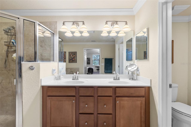 ensuite bathroom featuring crown molding, a sink, a shower stall, and ensuite bathroom